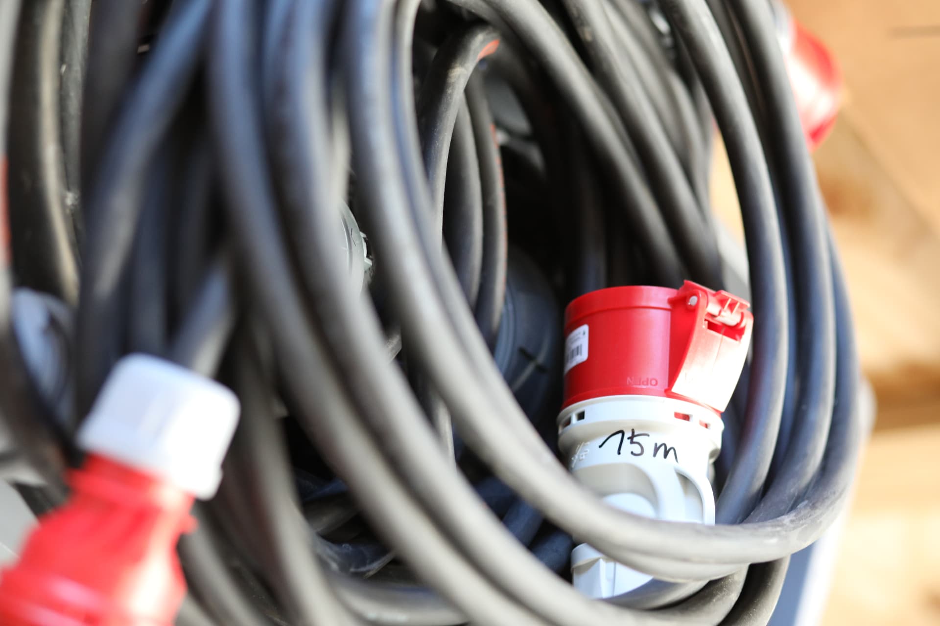 A 75 metre charging cable coiled up in the workshop