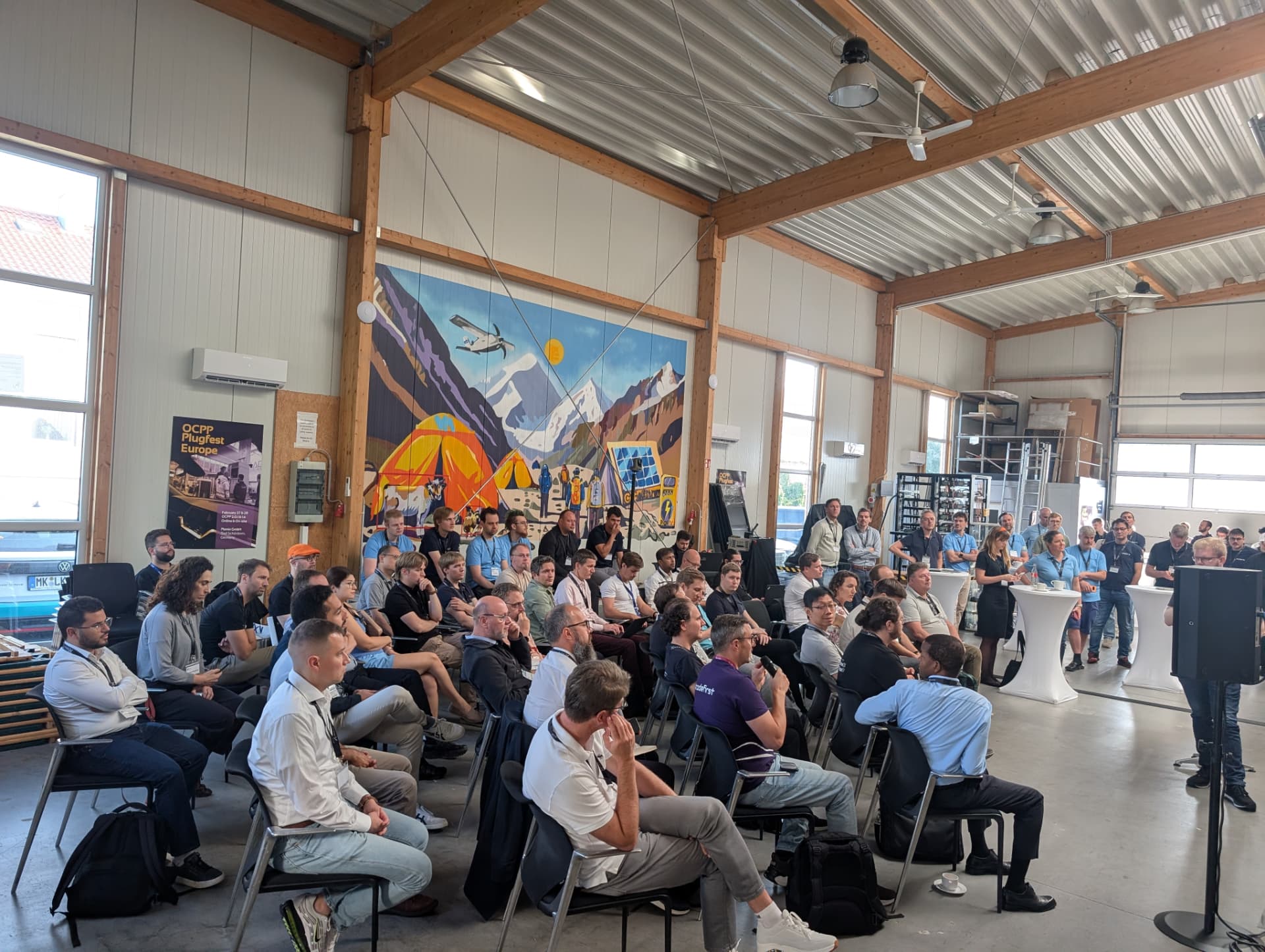 Full house in the Pionix hall during a talk at THE EV:ent 2026
