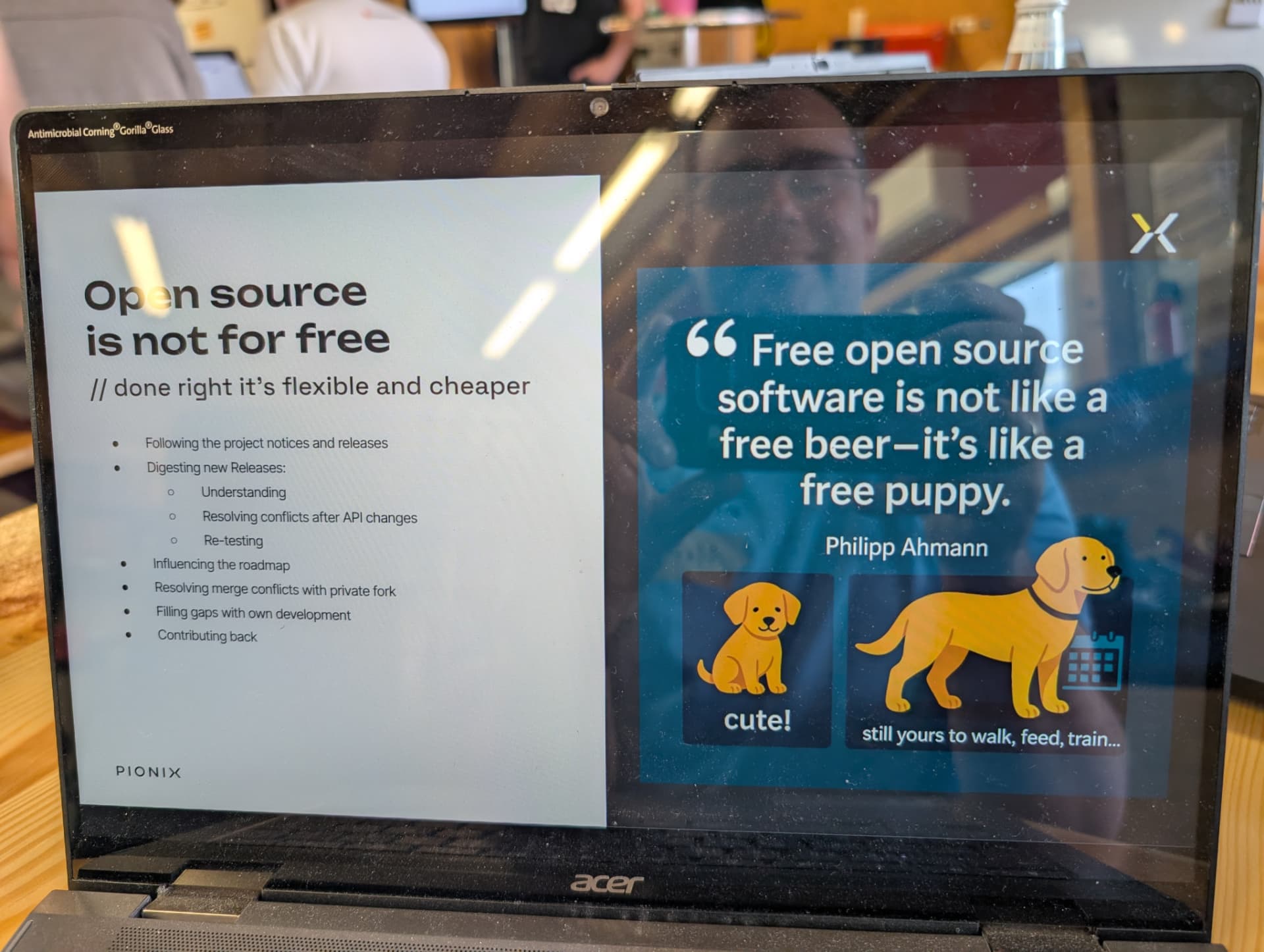 Slide reading 'Open source is not for free' during the hackathon